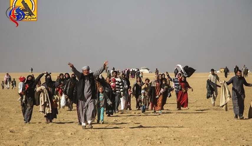 تلاش بسیج مردمی برای کمک به آوارگان عراقی