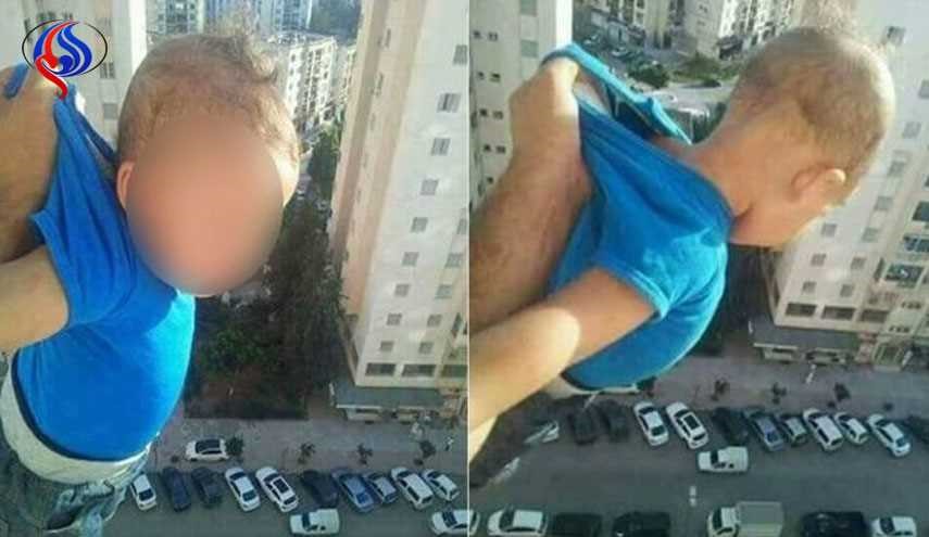 بازداشت مردی که فرزندش را از پنجره آویزان کرد!