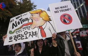 تظاهرات خیابانی در سئول همزمان با سفر ترامپ به کره جنوبی + تصاویر