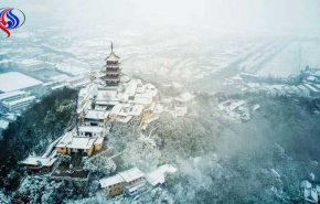 الثلوج تعطل النقل البري والجوي في الصين