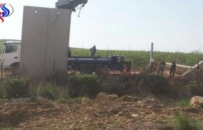 الكيان الاسرائيلي يبدأ بناء جدار فاصل على الحدود مع لبنان
