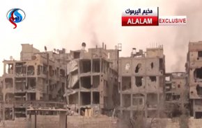  مراسلنا: داعش حرقت المنازل التي لم يطلها الدمار في الحجر الأسود + فيديو
