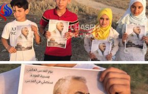 أطفال غزة يرفعون صور اللواء قاسم سليماني ويشكرونه 