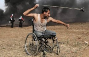 هذه الصورة المؤثرة لمُقعد فلسطيني تفوز بجائزة دولية