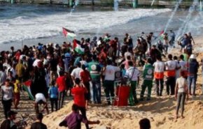 در«راهپیمایی دریایی» غزه یک فلسطینی شهید و 80 نفر زخمی شدند