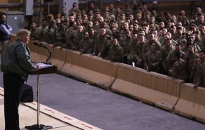 ترامب وزوجته في زيارة خاطفة للقوات الأمريكية في العراق