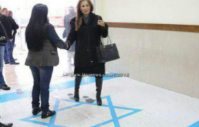 وزيرة أردنية داست على العلم الإسرائيلي وأغضبت تل ابيب