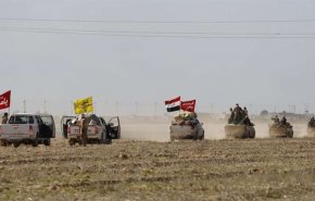 تنسيق أمني بين دمشق وبغداد لإنهاء داعش علی الحدود