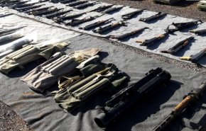 کشف سلاح های انگلیسی به جا مانده از تروریست ها در حومه دمشق
