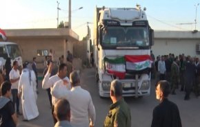 شاهد.. قوافل المساعدات العراقية تصل لمساعدة منكوبي السيول بإيران