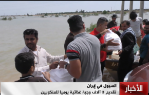 شاهد... يدا بيد لتخفيف اضرار السيول في خوزستان