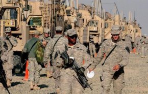 القوات الأمريكية تقتل شرطيا وتجرح اثنين في العراق 
