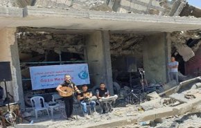 تزامنا مع ‘اليوروفيجن’ غزة تغني على أنقاض مبنى مدمر+صور