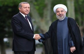 روحاني واردوغان يشددان على تطوير التعاون