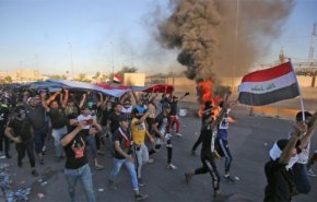 الحكومة العراقية تشدد على ضرورة تلبية مطالب المتظاهرين ونبذ العنف