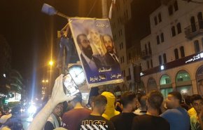 تظاهرات گسترده در لبنان؛ از پایین کشیدن عکس سعد حریری تا تیراندازی هوایی در بیروت