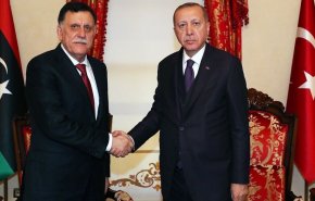 أردوغان والسراج يبحثان تنفيذ مذكرتي التفاهم البحرية والأمنية