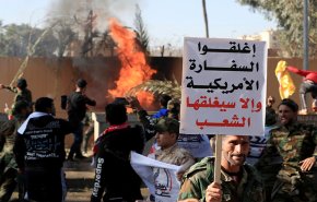 مطالب المتظاهرين العراقيين امام السفارة الاميركية