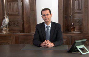 الرئاسة السورية تكشف معاني الرموز التي ظهرت خلف الرئيس الأسد