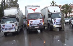 شاهد.. قافلة مساعدات إيرانية تصل الى مخيم اللاجئين في سوريا 