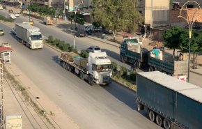 شاهد: قافلة شاحنات تدخل الى سوريا عبر كردستان العراق