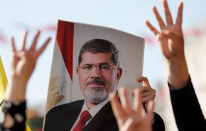 بالفيديو.. فوضى في البرلمان التونسي بسبب صورة مرسي
