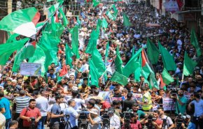 سلسلة بشرية بغزة: فلسطين لنا من بحرها إلى نهرها
