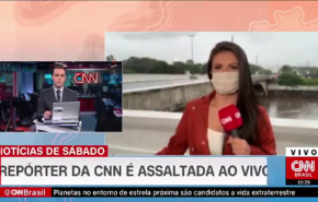 شاب يهاجم مراسلة (سي إن إن برازيل) على الهواء ويطلب منها طلبا غريبا!