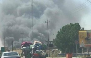 آتش سوزی گسترده در ۲۰ انبار مواد غذایی در نجف اشرف + فیلم