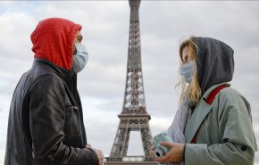 فرنسا تلزم ارتداء الكمامة في أماكن العمل من بداية سبتمبر
