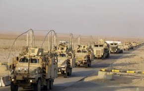 شاهد: العراق يتسلم موقعا في معسكر التاجي من 'التحالف الاميركي'