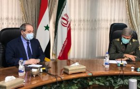 دیدار امیر حاتمی و فیصل مقداد/ تاکید وزیر دفاع بر عزم ایرانی برای بازسازی سوریه
