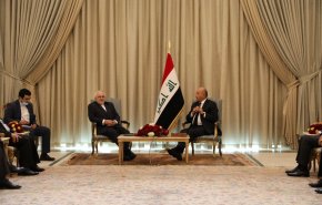 ظريف يلتقي الرئيس العراقي في بغداد