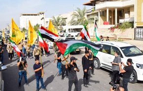 النجباء يرفعون اعلام الدفاع عن فلسطين في كل انحاء العراق 