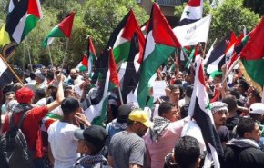 سورية..وقفة تضامنية مع الشعب الفلسطيني أمام مقر الأمم المتحدة بدمشق
