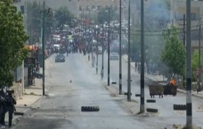 درگیری شدید فلسطینیان با نظامیان صهیونیست در کرانه باختری+فیلم