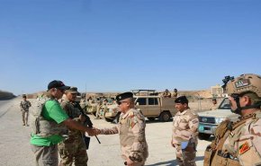 العراق يتسلم معدات من التحالف في قاعدة عين الاسد +صور