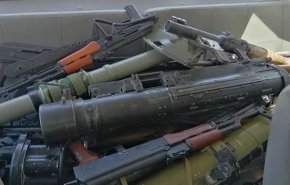 شاهد: 400 مسلح ومطلوب في درعا البلد يسلمون سلاحهم 
