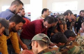 شاهد.. استمرار عملية تسوية الاوضاع في محافظة درعا السورية