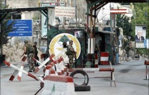 استنفار عسكري بمخيم عين الحلوة جنوبي لبنان والسبب صورة للشهيد سليماني