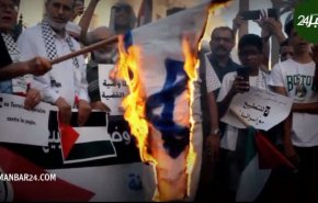 تظاهرات کنندگان مغربی پرچم رژیم صهیونیستی را به آتش کشیدند