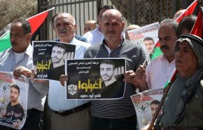 وقفتان في غزة ونابلس للمطالبة بالإفراج عن الأسير ناصر أبوحميد 