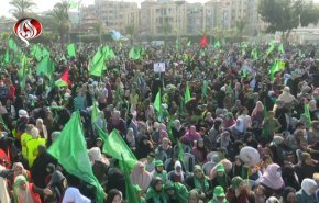 گزارش العالم از سیل خروشان فلسطینیان در سی و پنجمین سالگرد تشکیل «حماس»