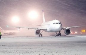 الثلوج تتسبب بالغاء 57 رحلة جوية في مطار مشهد الدولي