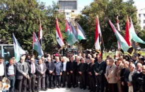 وقفة تضامنية في دمشق للمطالبة برفع الحصار على سورية