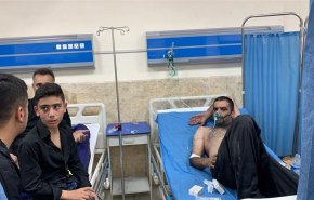 72 مصابا أغلبهم إيرانيون في حريق بفندق في مدينة النجف الاشرف + صور