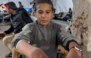 کودک فلسطینی که صهیونیستها او را کتک زدند
