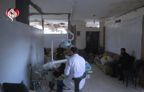 غزة.. طبيب أسنان يعيد افتتاح عيادته متحدياً دمار الاحتلال