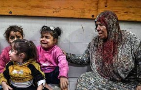 شاهد:جدار يحول لسجل مفتوح لأسماء أكثر من 18 ألف طفل شهيد بغزة