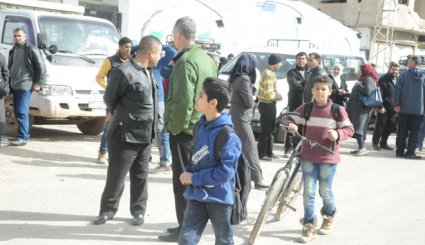 بالصور.. عودة أكثر من ألف أسرة مهجرة لمنازلها بريف دمشق